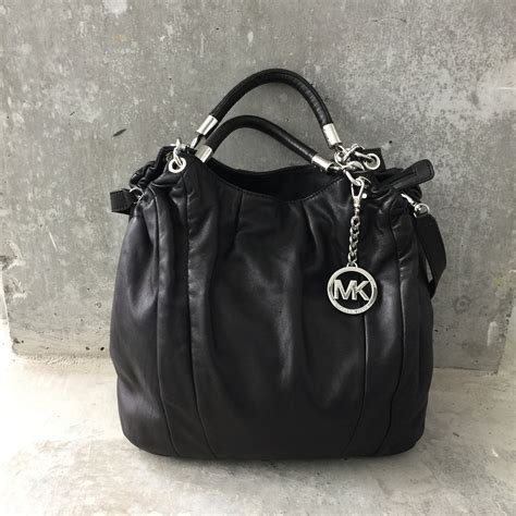 what type of leather is michael kors|Michael Kors genuine leather handbags.